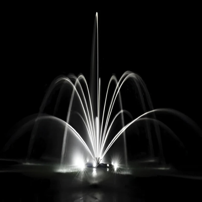 Airmax Double Arch Geyser Fountain Nozzle On Water with Led Light at Night | Your Pond Pros