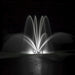 Airmax EcoSeries Double Arch Fountain Nozzle Operating In Pond at night with white LED lights| Your Pond Pros