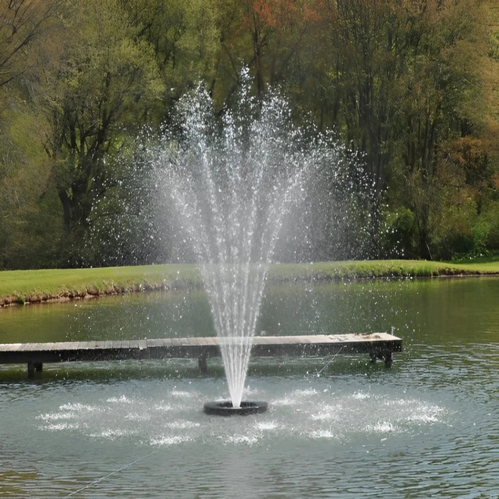 Fountain in a pond next to  small deck using the Bearon Aquatics Eros Nozzle | Your Pond Pros