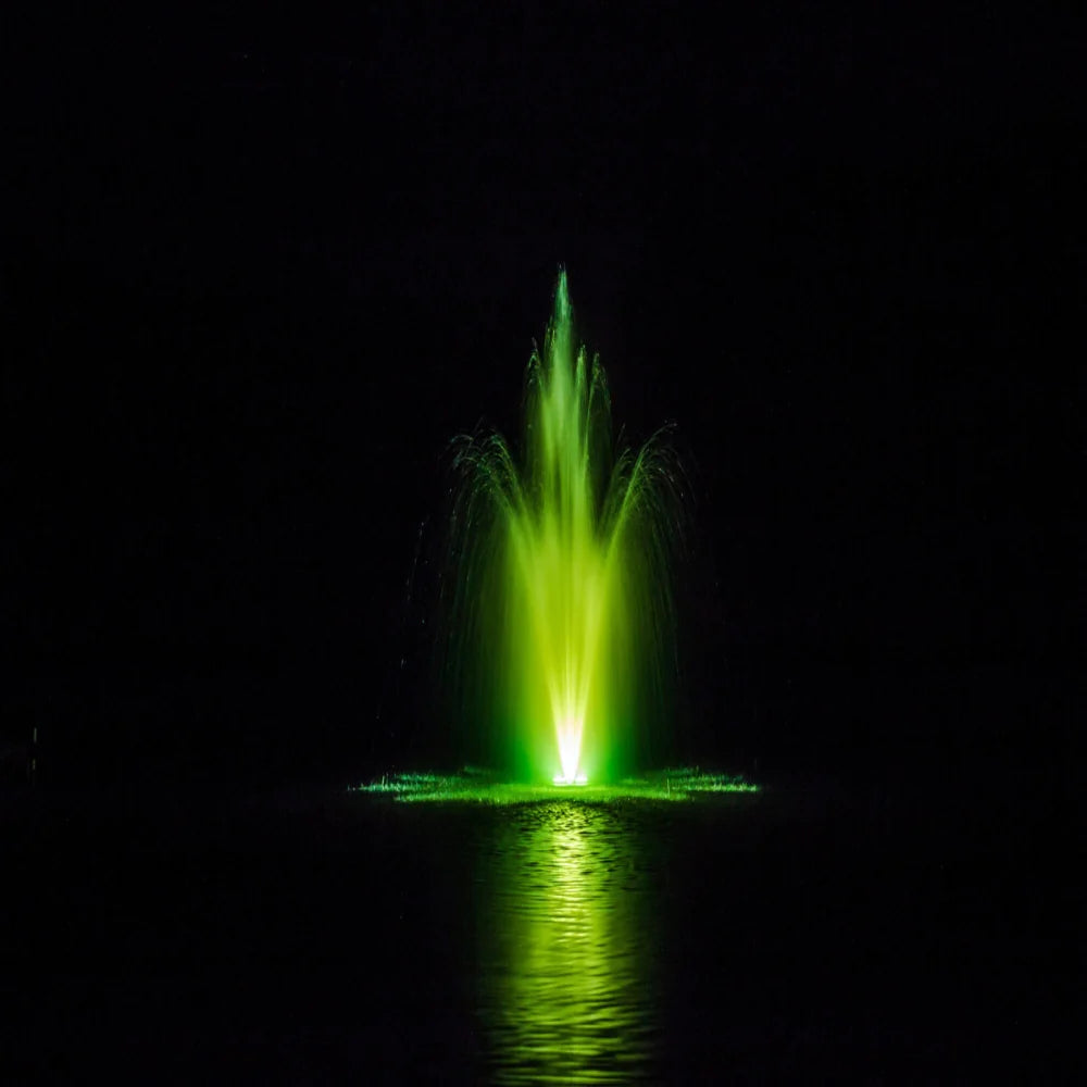 Bearon Aquatics Pontus Nozzle operating in pond at night with green LED lights | Your Pond Pros