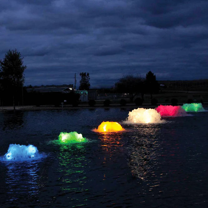 Your Pond Pros | 5 Kasco 5 HP Surface Aerators next to each other with different colored lights in pond