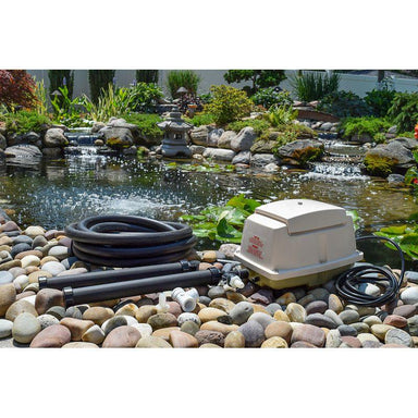 LA15W 80 Watt LA15W Deluxe Linear Aeration Kit Components on ground next to Koi pond | Your Pond Pros