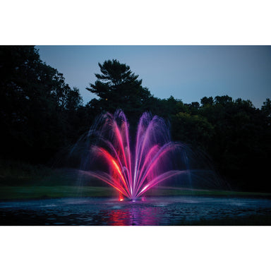 Kasco J Series Fountain operating in pond with pink light from Kasco LED RGB Light Kit | Your Pond Pros